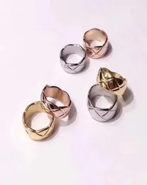 Diseñador de moda joyería mujeres anillos de boda anillo de oro de acero inoxidable corte de sarga hombres y mujeres anillo de pareja moda salvaje no allergi7415026