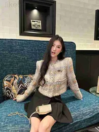 Kvinnors jackor designer märke xiaoxiangfeng kortrock 2023 ny fransk kändis stil vävd modern rund nacke cardigan topp q862