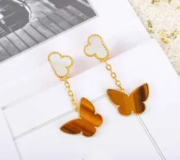 S925 Silver Top Quality Flower One Flower and Butterfly Shape Clip arring مع قذيفة بيضاء وحجر نمر للنساء مجوهرات الزفاف GIF3120001