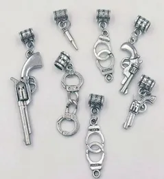 Collana pendente 100 PZ / lotto Proiettili Pistolrevolver Manette Ciondoli Collana Bracciali Accessori Gioielli Regalo di moda 7376382