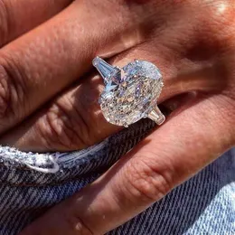 2022 Top vender anéis de casamento espumante luxo jóias 925 prata esterlina lagre oval corte branco topázio cz diamante pedras preciosas festa ete207w