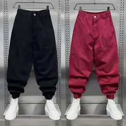 Męskie spodnie bawełniane mnożą ładunek kieszonkowy moda hip-hopowa luźne harem szerokie spodni jesień czerwone spodnie projektanta marki odzież