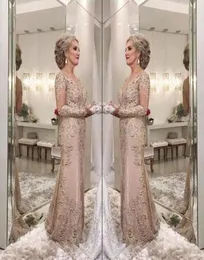 2018 Luxury Mother of the Bride Dresses V Neck långa ärmar kristallpärlade sjöjungfrun spetssapplikation plus size party kväll bröllop g3470866