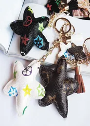New Brand Keyrings PU Leather Pendant Bag Charms Cute Fashion Gift Keychain Ring Holder Flower Dog Giraffe Jewelry Car Key Chain A2012580