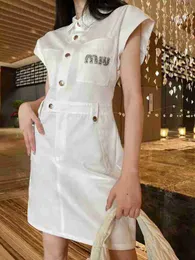 Robes décontractées de base designer mm printemps / été nouvelle poche décoration design style perlé lettre robe en jean mode féminine 12 m8jq