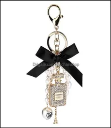 Keychains Fashion Accessories Creative Handmade Diy Diamond Per Bottle Alloy Bow Pearl Luxury Keychain Purses Charm Pendant Ys068 1744673