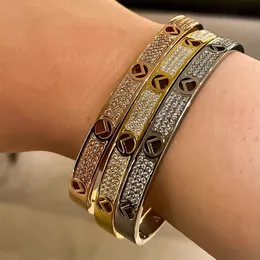 Titanium Steel Gold Charme Bracelete de prego parafuso Pulsera braçadeira de pulsera para homens e mulheres casais para casais amantes Jóias de presente N3072