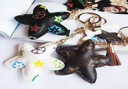 Nuovo marca Keyrings PU in pelle Pendant Borsa Ciondolo per la moda di moda carina porta portachiavi per cani fiore giraffe gioiello catena di auto A2074816