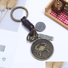 Nyckelringar Uppdatera bronsskiva Constell Keyring 12 Horoskop Sign Nyckelring Lädervävväska hänger hållare ringar för kvinnor män dhgarder dhurn