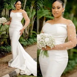 Plus Size Illusion Trompete Hochzeitskleid für Braut Meerjungfrau Aso Ebi Sheer Neck Langarmes Perlenbrautkleider für Ehe Afrikanischer Landstil CDW180