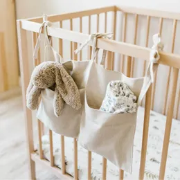 Bedside Storage Bag Baby Crib Organizer hänger för sovsalar Bed Bunk Hospital Rails Book Toy Diaper Pockets Holder 231227