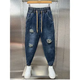 Masowe dziury dżinsy haruku biodro -hop streetwear luźne spodni na zewnątrz, wysoka jakość marki odzieży męska