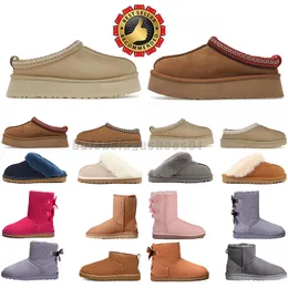 حار مان للنساء Ugstasman Slipper Snow Boots Sheepskin Plush Fur الحفاظ على أحذية دافئة مع بطاقات الغبار لبطولة Mini Boot ناعمة راحة عريضة هدايا جميلة