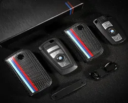 Pokrywa klawisza z włókna węglowego dla BMW E90 F30 F30 F10 E70 E71 X1 X3 X4 X5 X6 1 2 3 4 5 6 7 Serie Key Porther Bag4149573