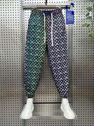 Karierte Blumenhose, modische Hip-Hop-Straßenhose, Haremstanzhose, neueste Marken-Herrenbekleidung