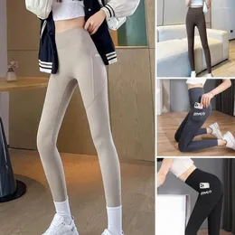 Calças ativas Cantura alta Slim Fit Sports de feminino macio com bolso de telefone de compressão que levanta a bunda para ioga