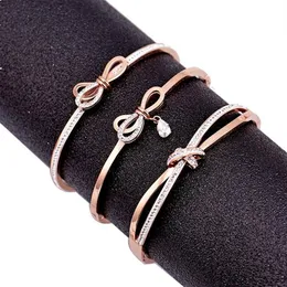 Pulsera de brazalete de acero inoxidable de titanio con nudo de lazo dulce de circonita de diamante de diseño de lujo para mujer y niña oro rosa 297Q