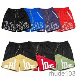 Rhude Mens Shorts Atlético Casual Malha Curto Homens Mulheres Alta Qualidade Clássico Praia Moda Luxo Designer Rua Hip Hop Azul Verde e Vermelho Tamanho S-XL I695 N4OG