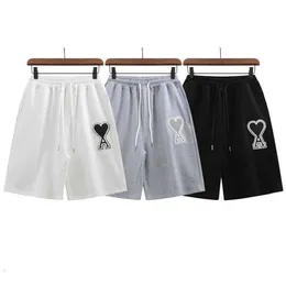 2023 moda calças divididas para homens e mulheres mesmo estilo verão nova marca de moda solta perna reta shorts casuais