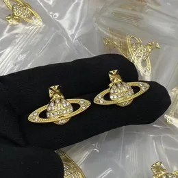 Designerörhängen fyrbladklöver örhänge för kvinnor senior klassisk liten doftande vindörhängen ny klöver öron ring 18k guldljus lyxiga flash mens