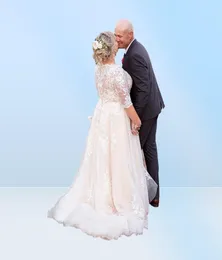 Suknie ślubne plus w rozmiarze na pół rękawie aplikacja koronkowa Tiul A Line Bohemian Boho Bridal Surs Gown Garden Country Wedding