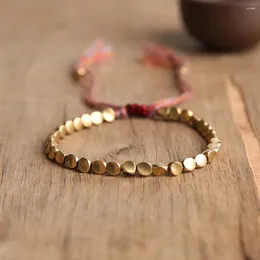Strand YUOKIAA Bracelets de perles de cuivre tibétains tressés à la main, bracelet de perles en fil coloré réglable