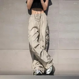 Herrbyxor tfetters varumärke metall nylon kvinnor lastbyxor vår baggy mikroelasticitet fallskärm manlig casual amerikansk streetwear