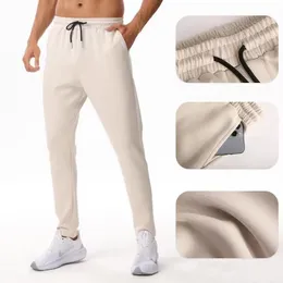 LU-022 Herr Jogger Long Pants Sport Yoga Outfit utomhus City Sweat Yogo Gym Pockets ll Sweatpants Byxor Mens Mens Casual Elastic Midje Fitness