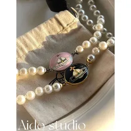 Viviennely Westwoodly Einzigartiges Design Pulloverkette Lisa Saturn Perlenkette für Frauen