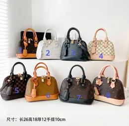 Borsa a conchiglia classica portatile di grande capacità alla moda da donna Zaino a tracolla coordinato in stile occidentale di bell'aspetto