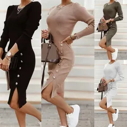 2024 Sexig bodycon slits stickad klänning kvinnors höst långärmad hög midje knapp midi klänning elegant o-hals elastisk parti 231230