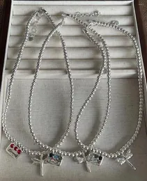 Collane con ciondolo 2023 UNOde50 Vendita europea e americana di alta qualità Gemma rossa Collana con libellula Borsa regalo gioielli romantici da donna