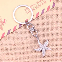 Nyckelringar 20st Fashion Keychain 24mm Starfish Pendants Diy Men smycken bil Key Chain Ring Holder Souvenir för gåva