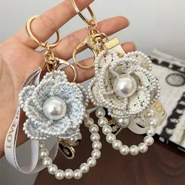 Sevimli güzel kalp kumaş çiçek inci anahtarlıklar için kadınlar için araba anahtar yüzüğü yeni moda çantası çanta takıları hediye kutusu ile anahtar zinciri