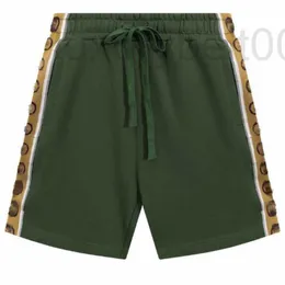 Designer de shorts masculino Calças de tecido elástico estampadas de alta qualidade, shorts soltos casuais versáteis GS49