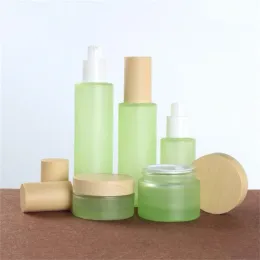 Nova garrafa de vidro verde fosco frasco de creme spray loção frascos de bomba recipiente cosmético 20ml 30ml 40ml 60ml 80ml 100ml 120ml com tampas de madeira imitadas