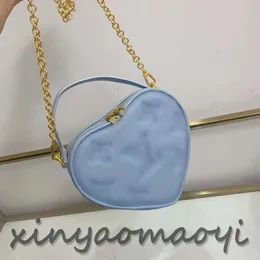 Leather Love Bag Women's Designer Shoulder Bag Luxury Fashion Express Bag Mini Purse Love shaped handbag Multi-color selection V103686 Light blue bag