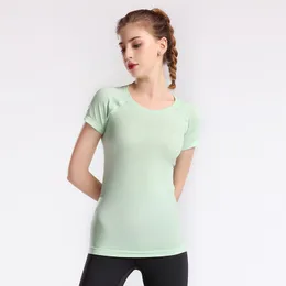 Ll designer t-shirt lulul yoga kortärmad solid färg lu sportplast midja tätt fitness lös jogging sport yogakläder kvinnors kortärmade lulu män