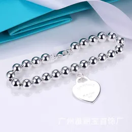 Качественный качество Tiffay Love Peach Heart Bracelet Женская с ЧПУ