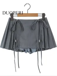 Jupes DUOPERI femmes mode solide à lacets plissé avant fermeture éclair Mini jupes Vintage taille haute femme Chic dame jupe courte 230710