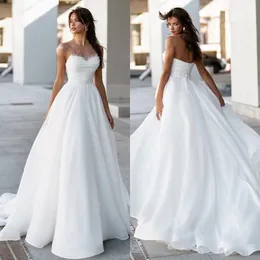 Sexy A Line Wedding Dresses for bride Sheer Neck Pearls Sequins Sweetheart Wedding Dress Backless Long designer bridal gowns sweep train