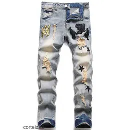 Amirs Men Jeans Designer Stacked for Men Rips Skinny Rasgado Calça preta com buracos camisa jeans perna reta ajuste fino zíper Amari Bikers motocicleta BJAT