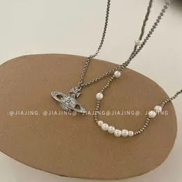 Personalisierte Saturn-Halskette mit leuchtenden Perlen und Diamanten im Stil, leichter Luxus und vielseitiges Nischendesign, Schlüsselbeinkette für Frauen