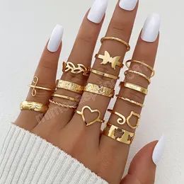 Nowe pierścionki w kolorze złotym dla kobiet mężczyzn wydrążone serce motyla liście wzór geometryczny modne pierścionki zestaw modna biżuteria