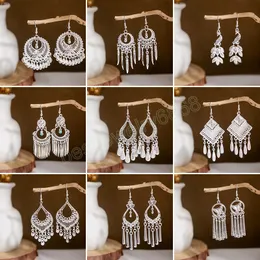 Orecchini pendenti vintage con nappa lunga color argento Orecchini pendenti pendenti con pavone geometrico retrò per gioielli indiani da donna