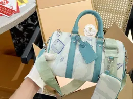 2023 Yeni Xs Seyahat Torbası Omuz Torbası Graffiti Mini Rüya Çanta Bandouliere 25 Tote Steamer Lüks Lüks Messenger Erkekler Çanta Tasarımcı Crossbody Woman Washing Bag