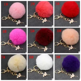 8 cm Bow Nyckelringar Päls Ball Nyckelringar Mjuk Bowknot Lovely Gold Metall Nyckelringar Väska Charm Hänge Pompom Pom Poms Plysch bilnyckelringar