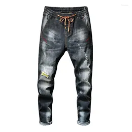 Jeans da uomo LOMEMOL Autunno/Inverno Pantaloni elasticizzati coreani sottili Pantaloni giovanili strappati con lacci Mens Denim Patchwork Skinny Men