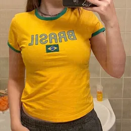 女性用Tシャツキューティストブラジルクロップトップイエローサマー服女性サッカークロップベイビーTシャツY2Kセクシーなウルトラ薄片グラフィックTシャツ230714