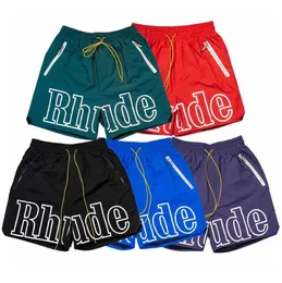 shorts de grife rhude moda de verão calças de praia masculinas de alta qualidade roupas de rua vermelho azul preto roxo masculino US tamanho S-XL design solto600ess